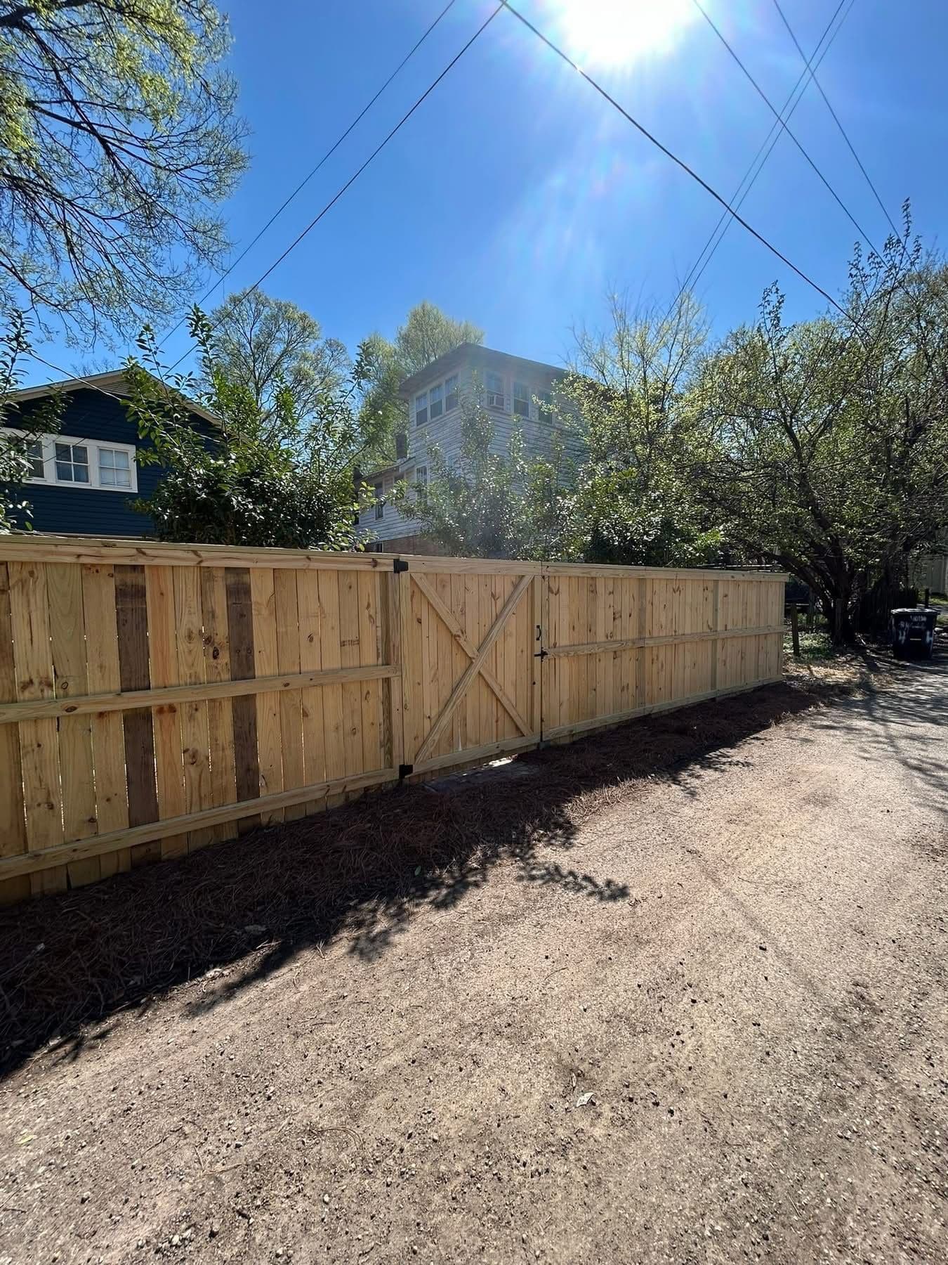 Gallery photos for Wood Privacy Fence and Dry Creek Bed Drainage Fix: Image #1